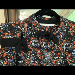 Long sleeve blouse with bow ties